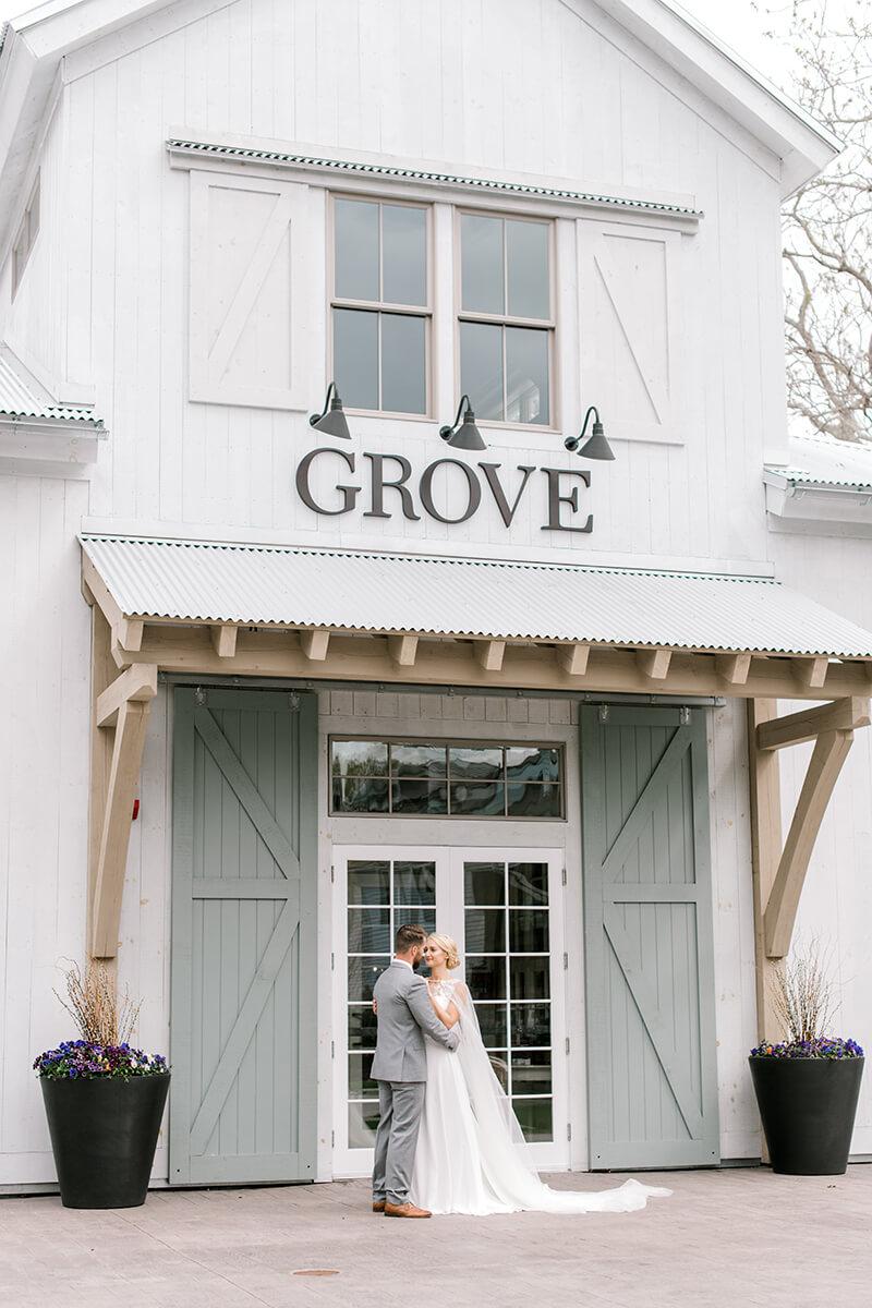 Couple at wedding venue entrance