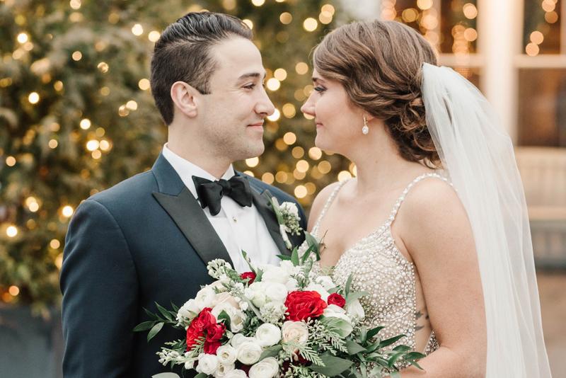 Bride and groom at wedding with holiday decor