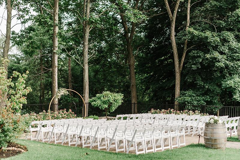 Outdoor patio ceremony with arbor