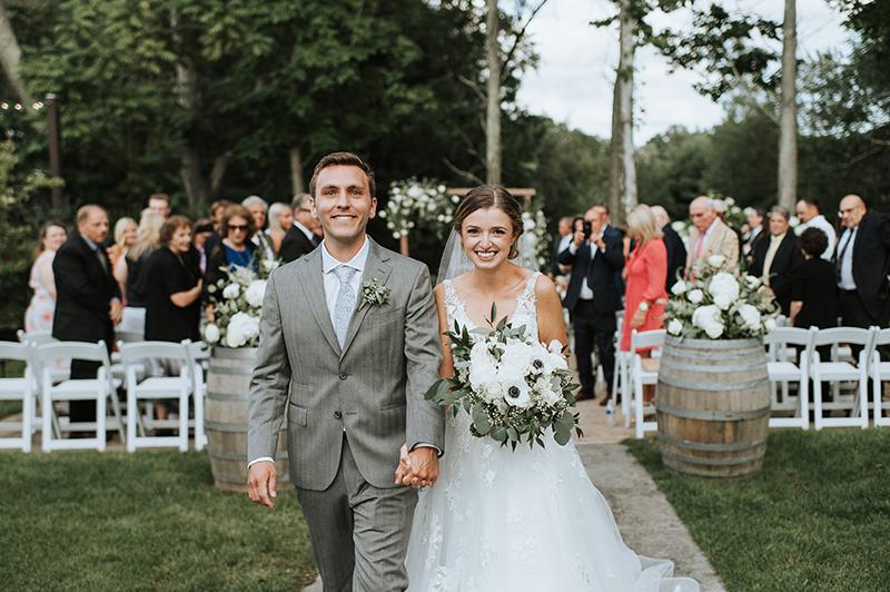 Couple leaving wedding ceremony