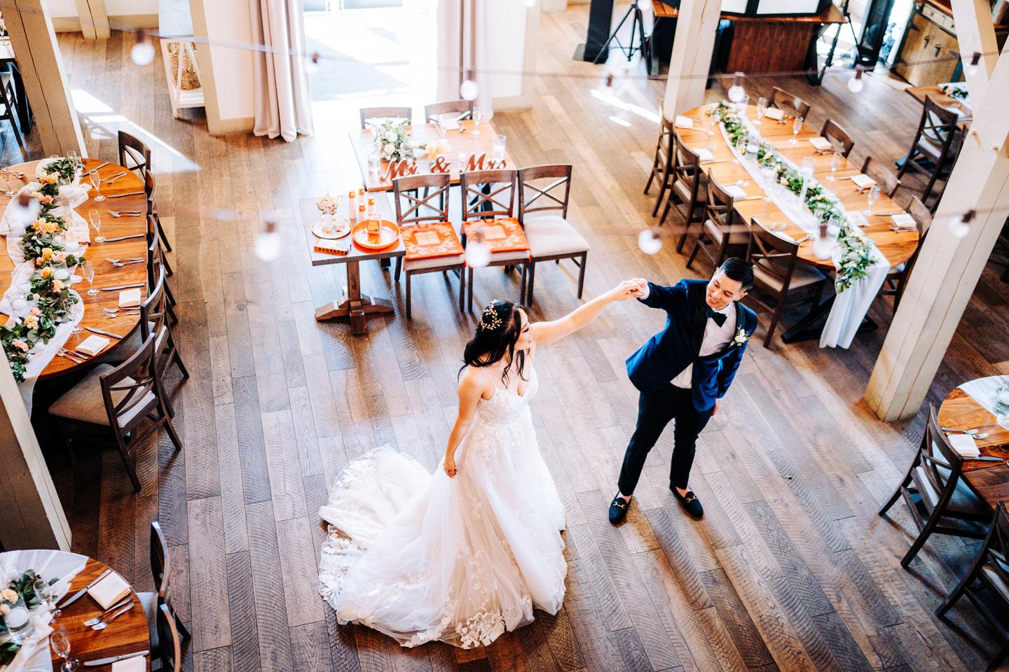 aerial view of bride and groom sharing first dance
