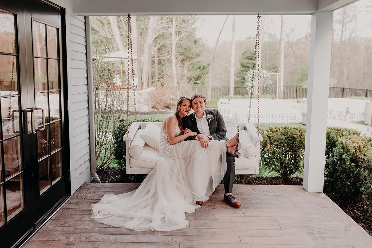 Brides on porch swing