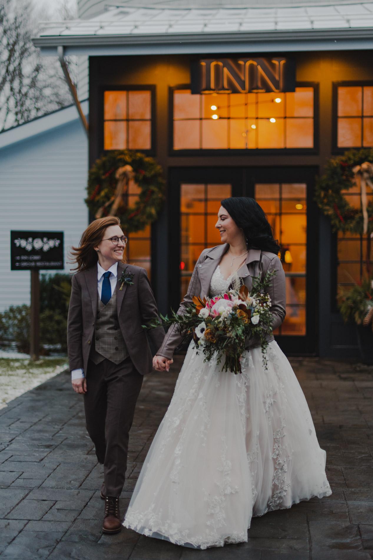 couple in front of inn