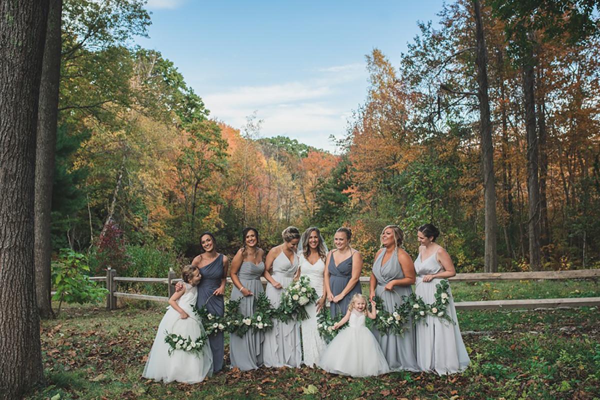 bridesmaids with fall foliage