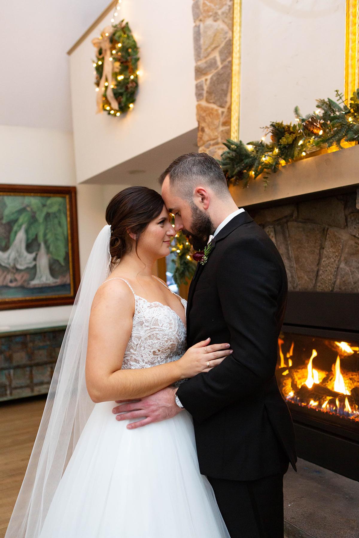 couple by fire place