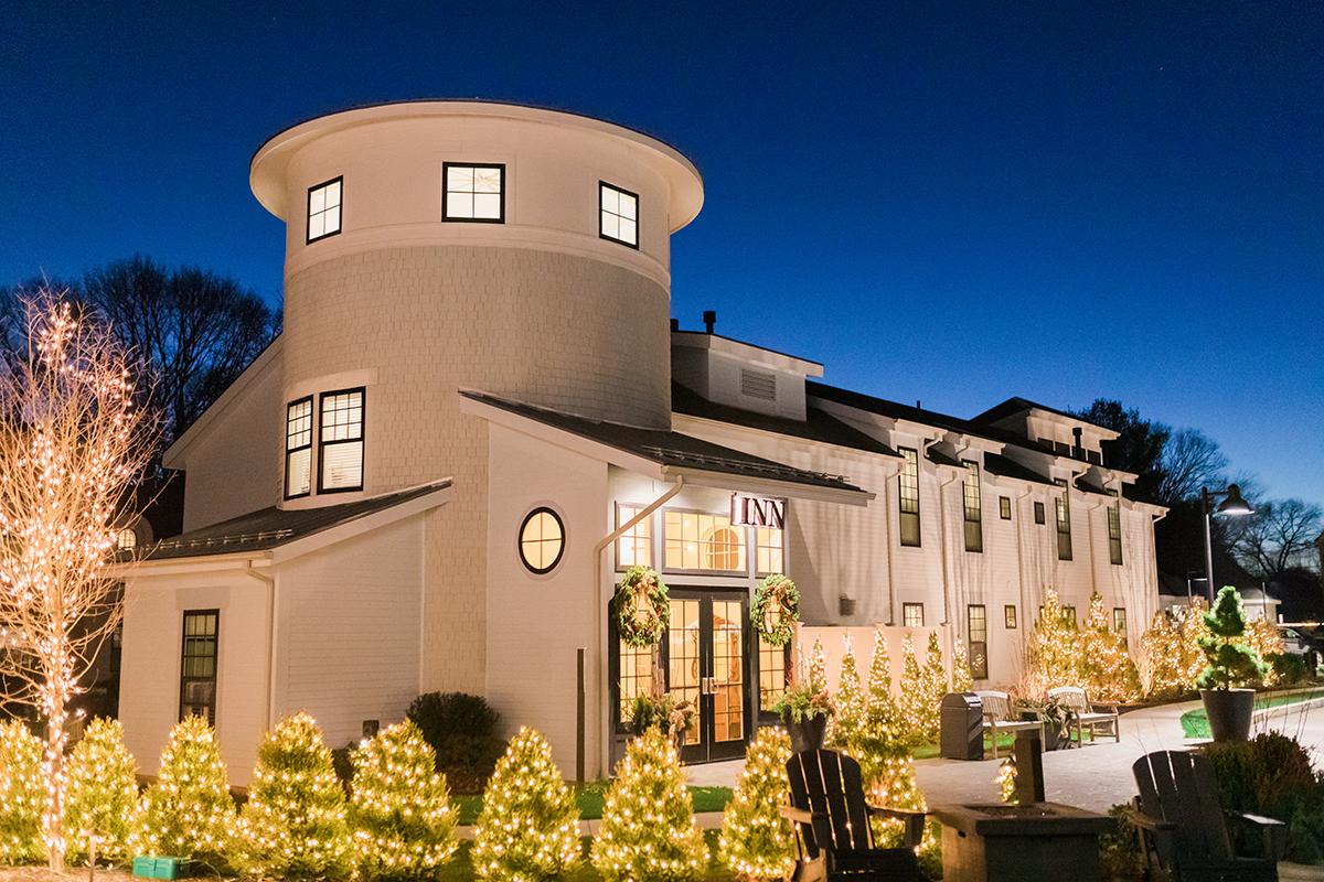 inn at night with holiday decor