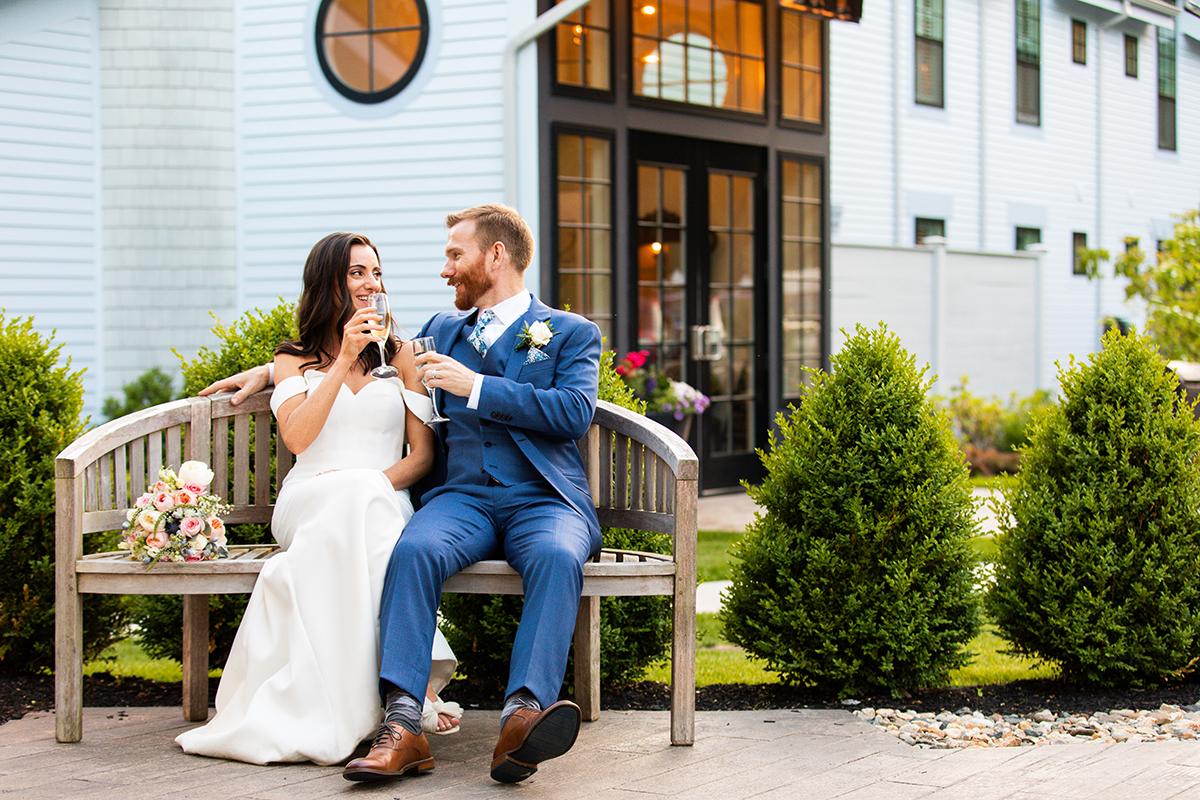 couple sitting outside inn