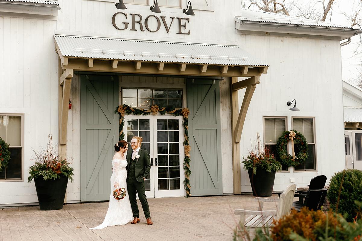 couple in front of grove