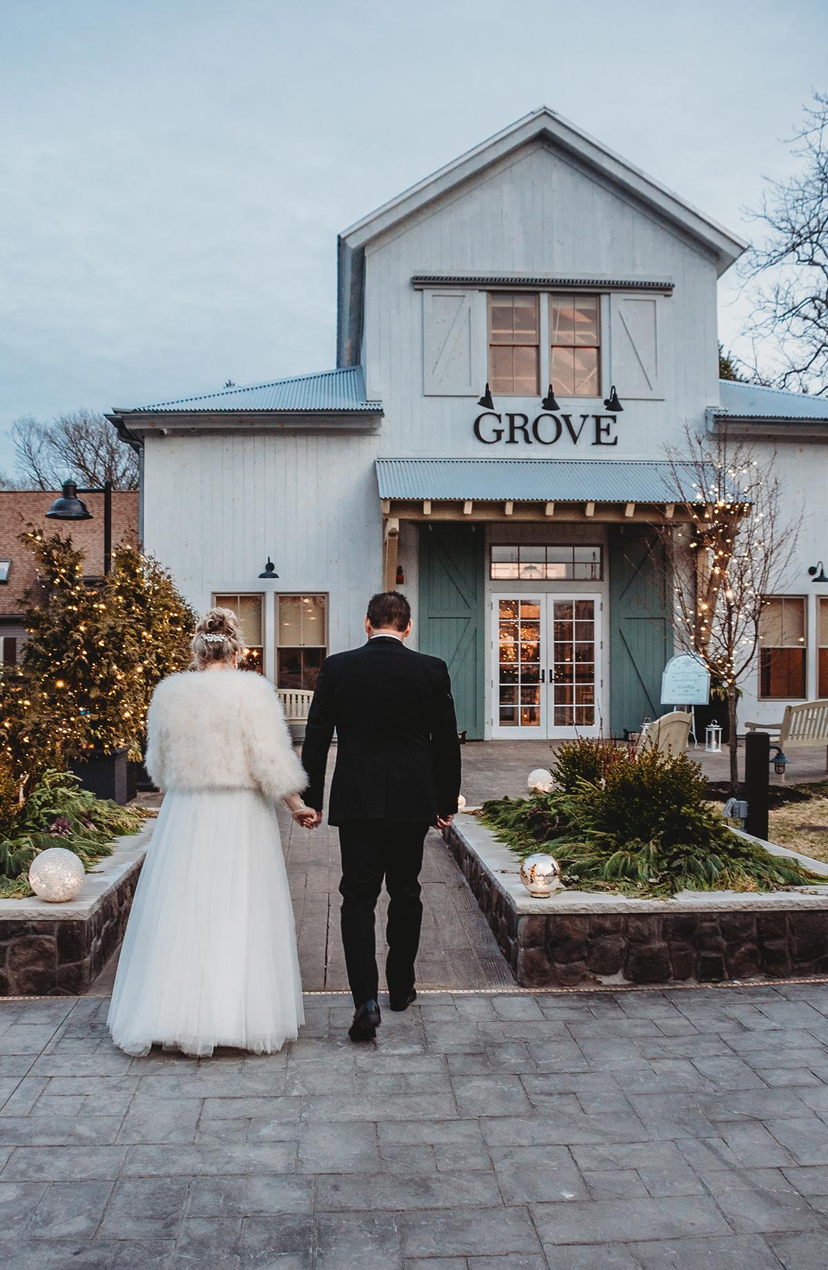 couple in front of grove