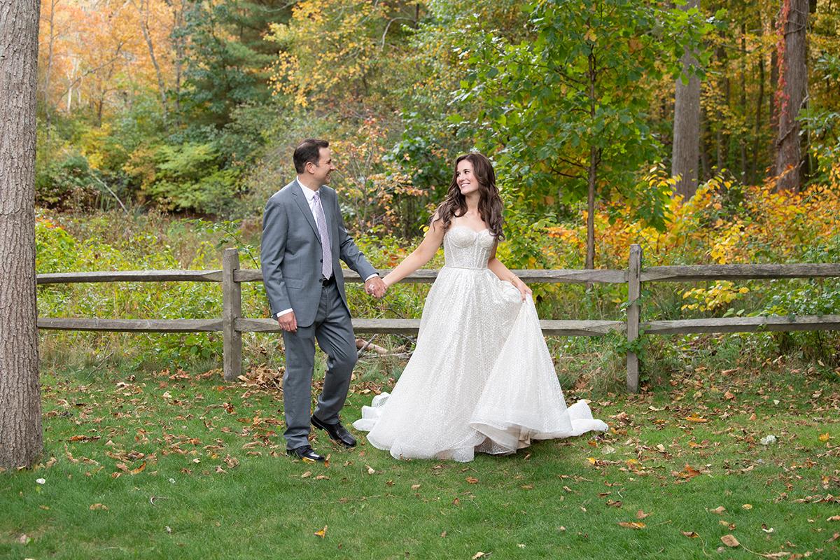 bride and groom in woods