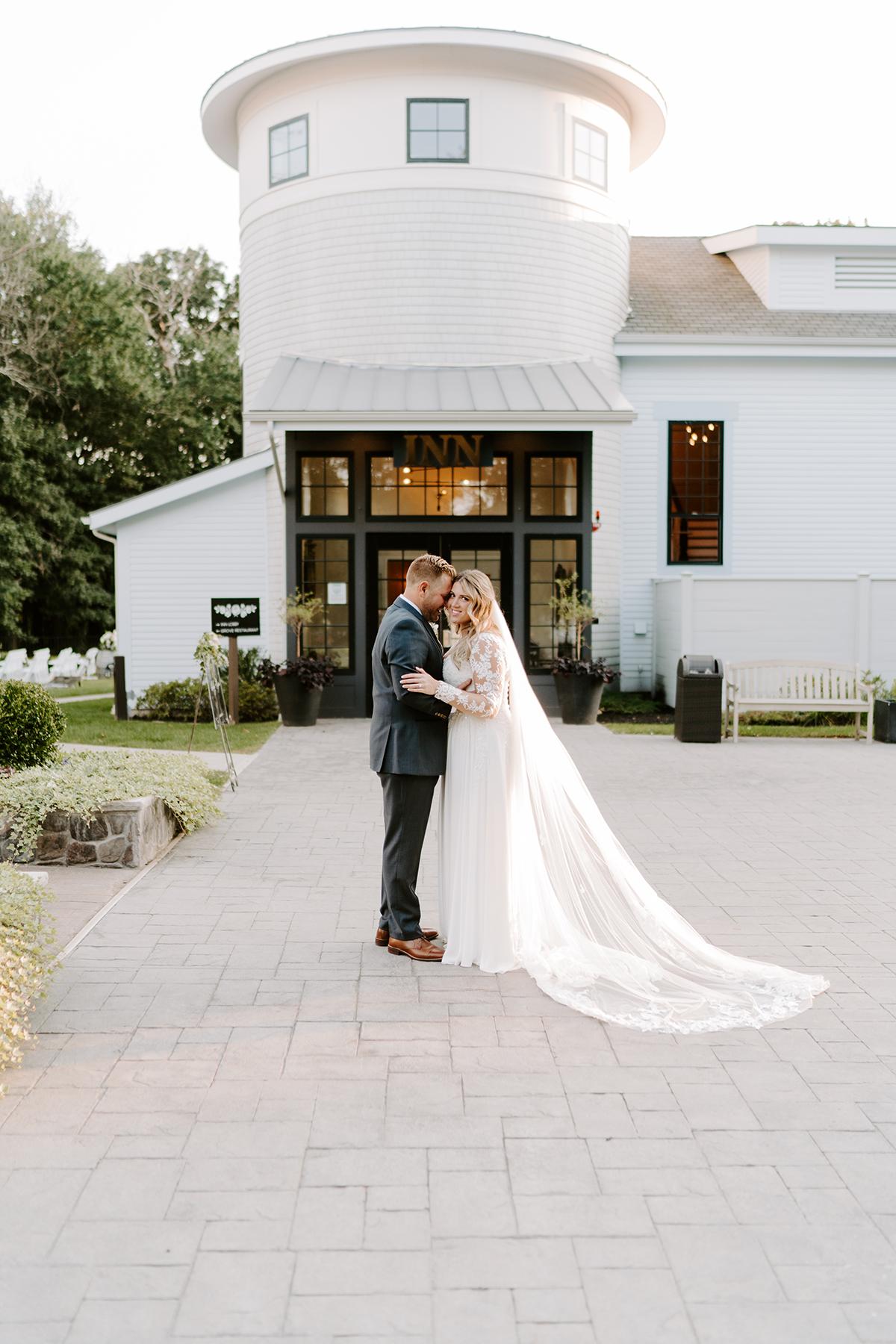 couple in front of inn