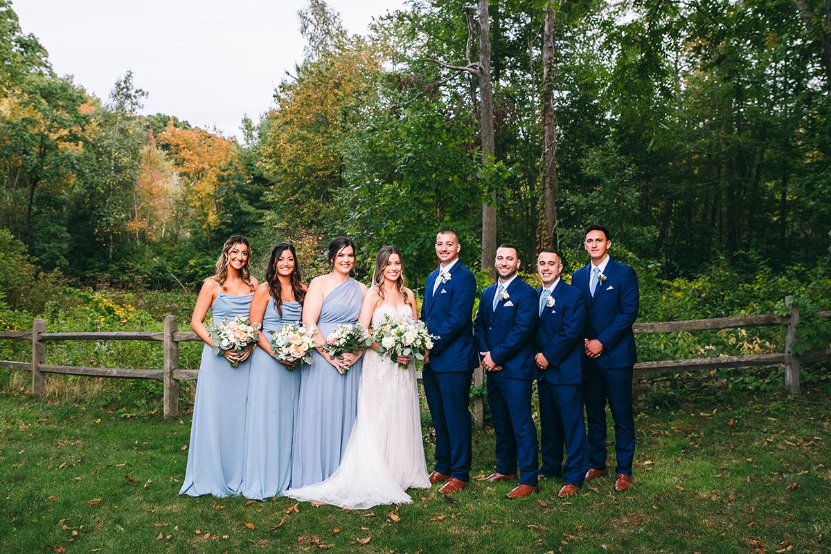 wedding party with fall foliage