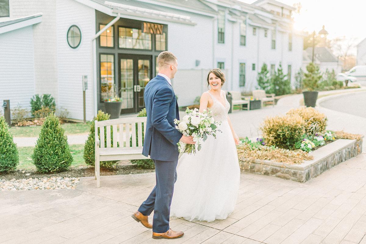 couple in front of inn