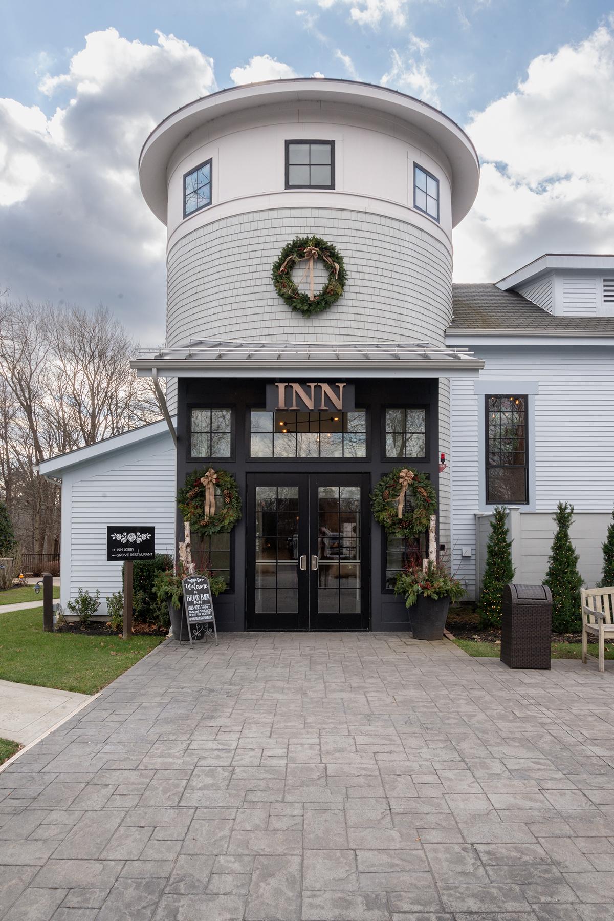 inn entrance with holiday decor