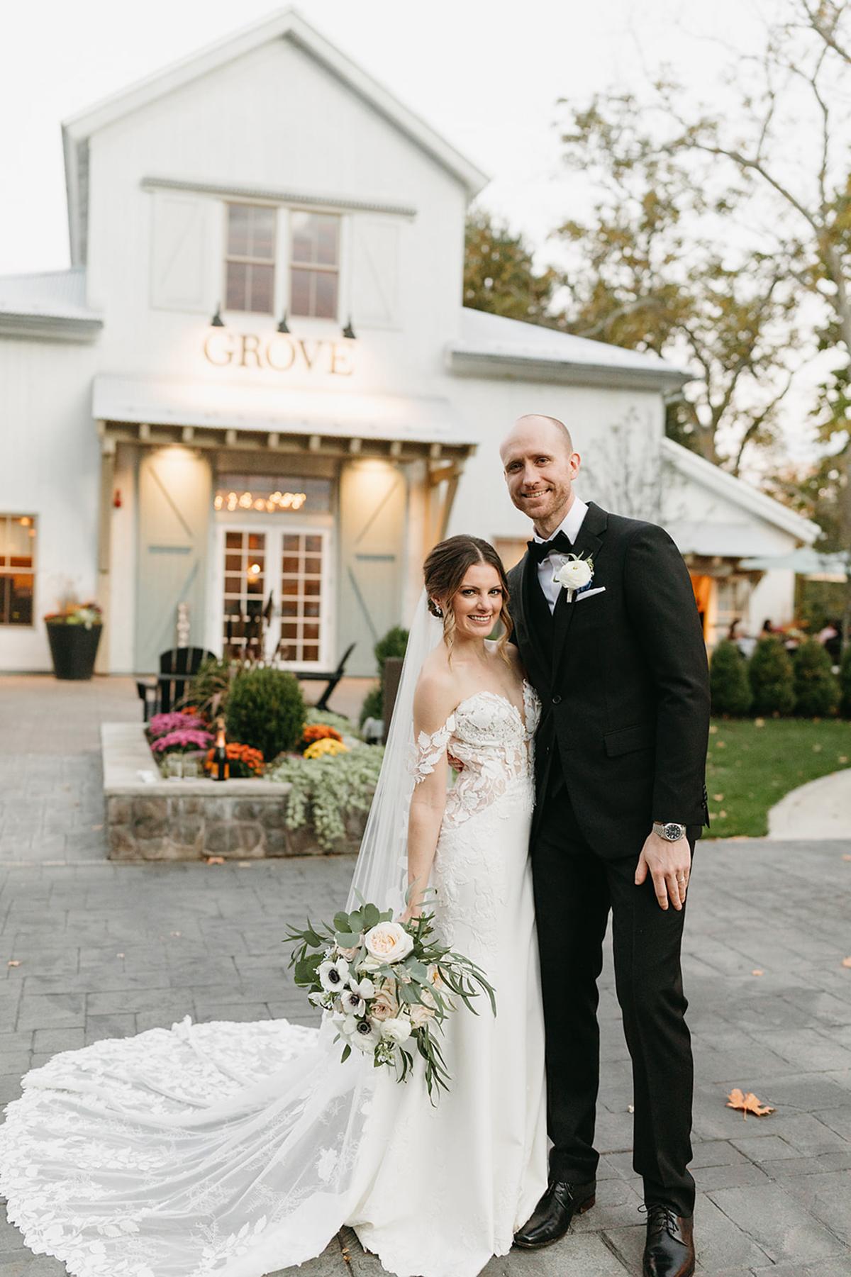 couple in front of grove