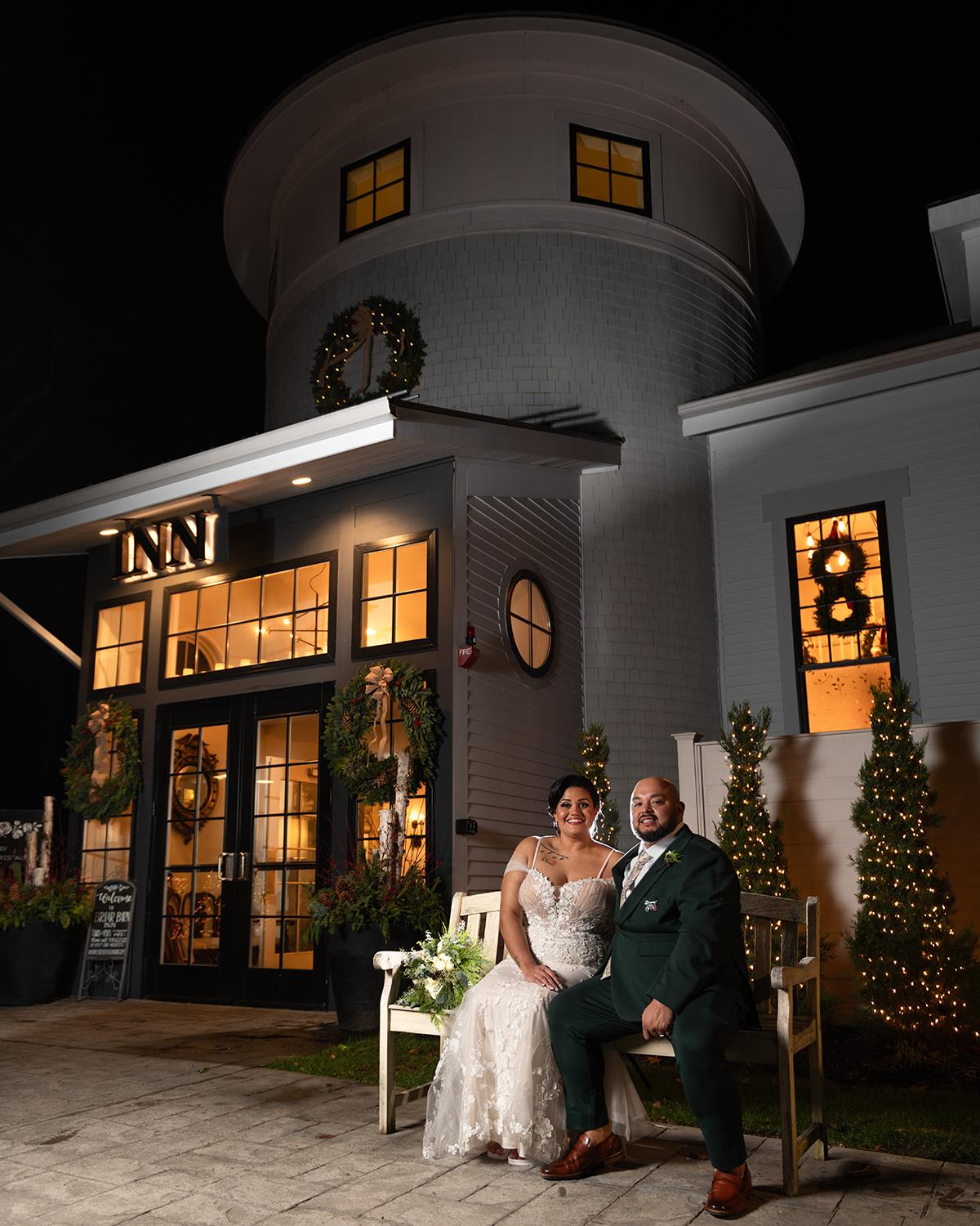 couple in front of inn