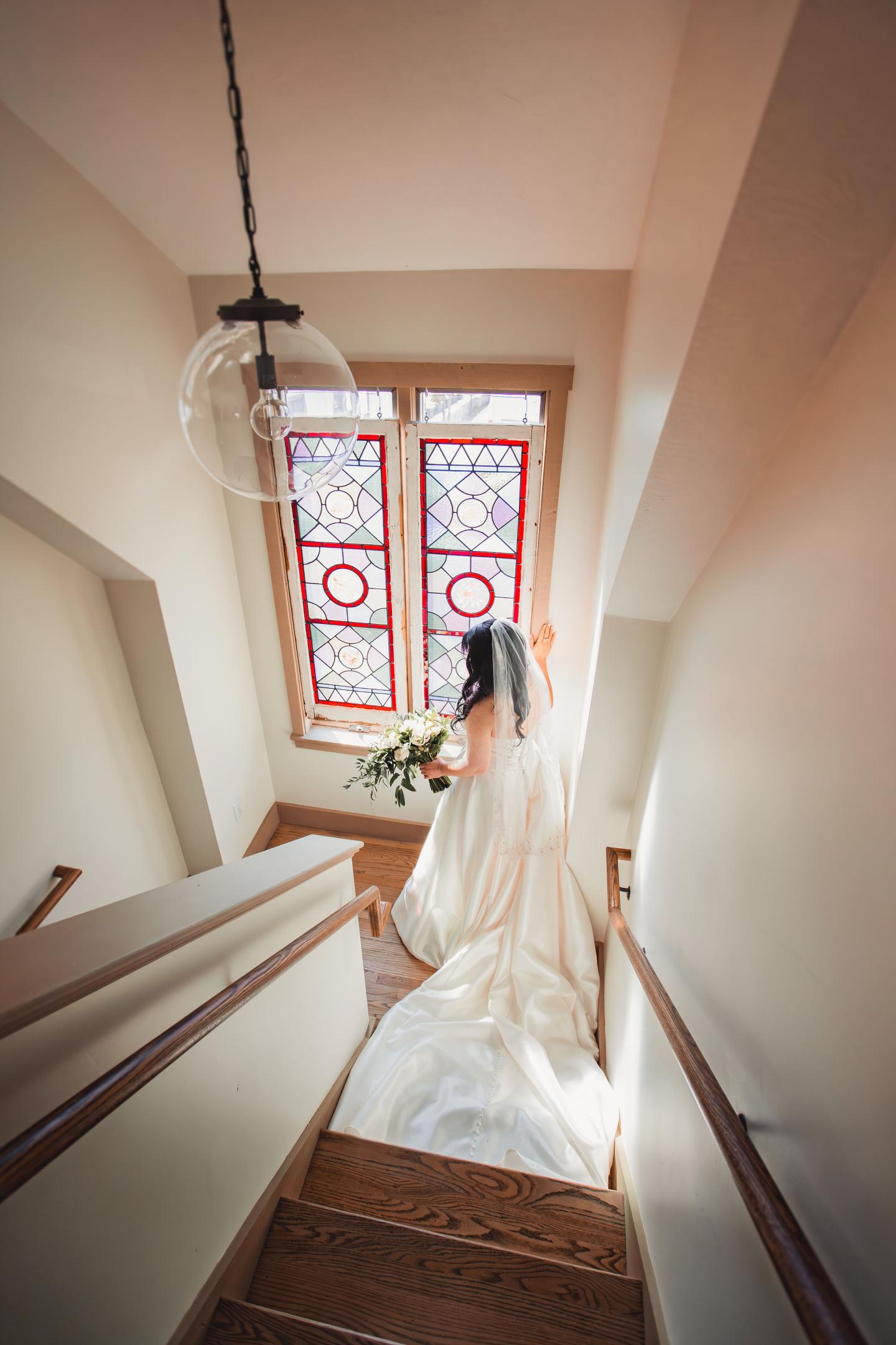 bride by stained glass