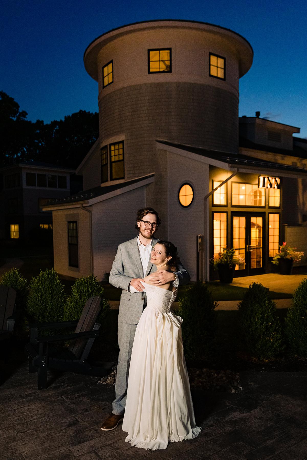 couple in front of inn