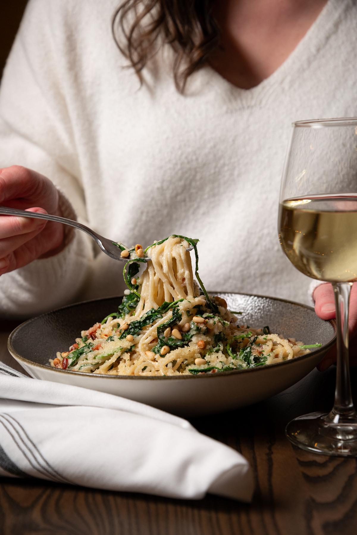 guest with pasta entree